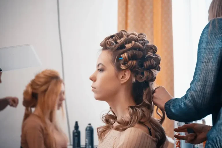 Hairdresser Applying Hair Extensions