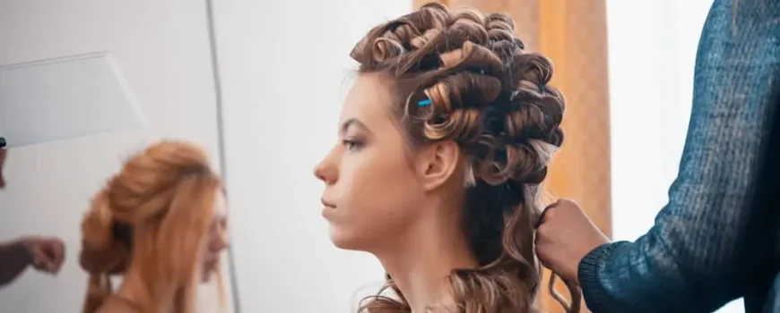 Hairdresser Applying Hair Extensions